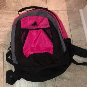 Pink and black Adidas backpack